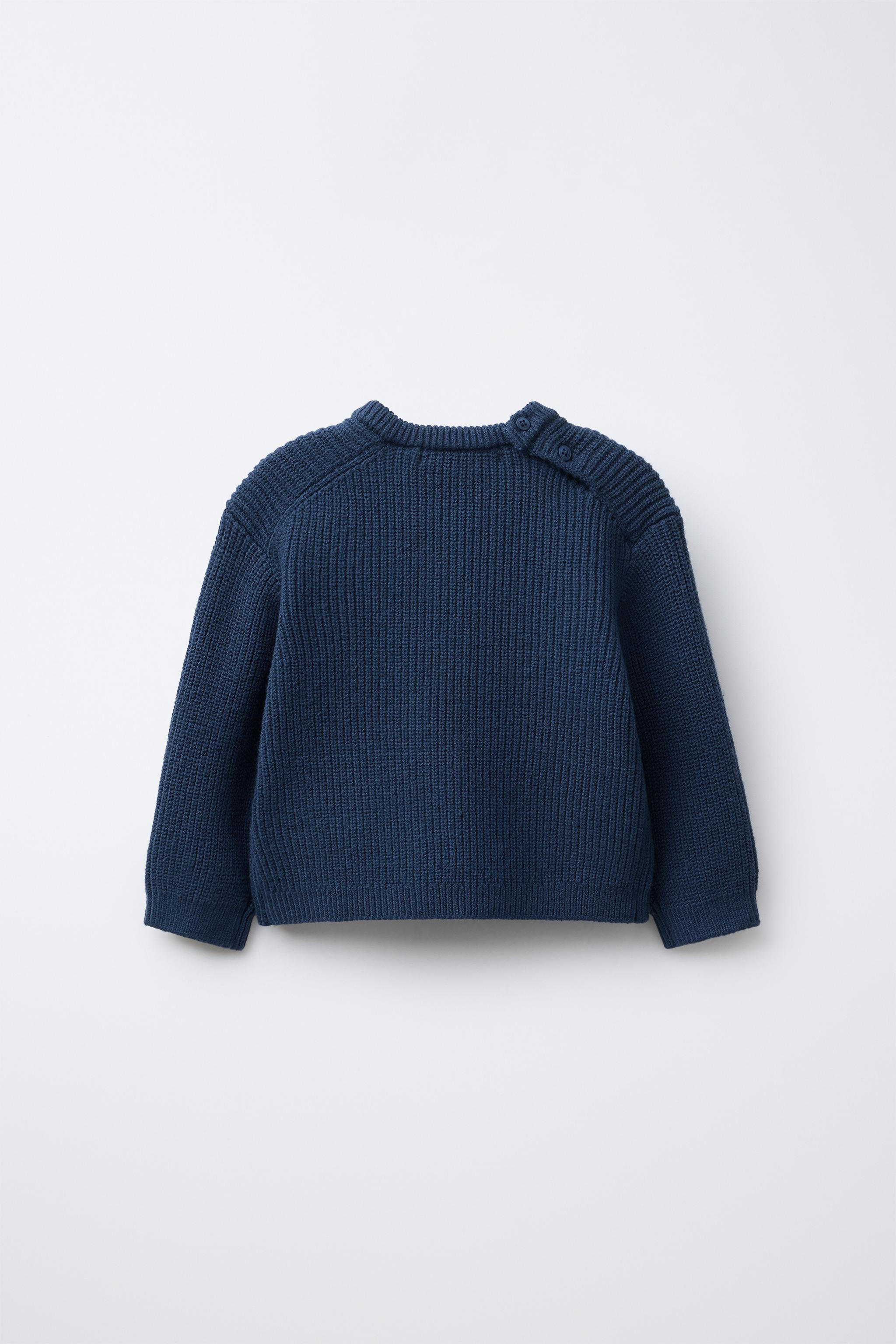 PULL EN MAILLE PERLÉE AVEC OURSON BRODÉ